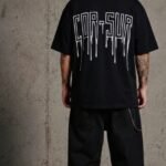 REMERA OVER cor sur